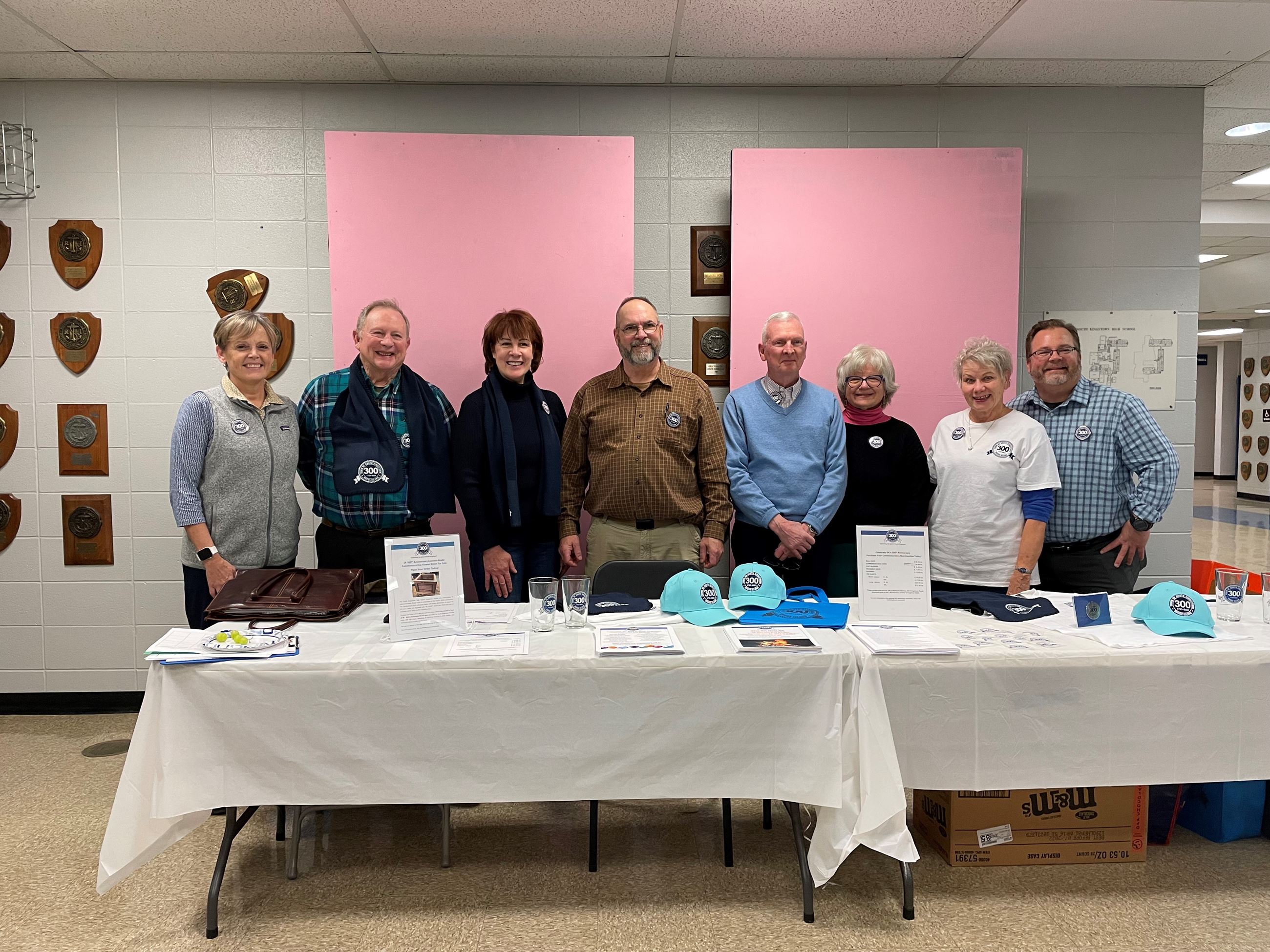 300th Committee with merchandise